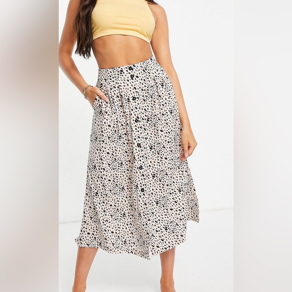 Asos design button through midi skirt in animal print. Size 4